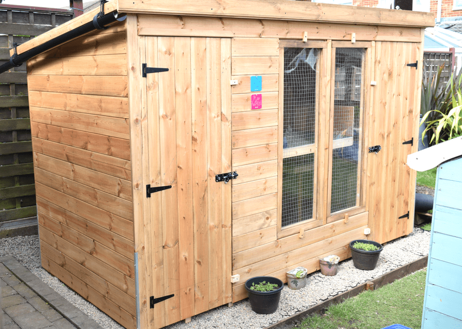 Plastic Shed Base Used Under a Rabbit Kennel And Run Featured Image