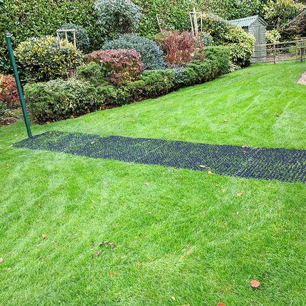 Rubber Grass Mats Under Washing Line