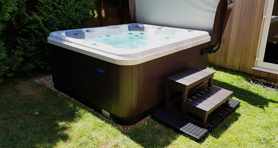 7ft x 7ft Hot Tub Base Installed Under A Riptide Hot Tub - Featured Image