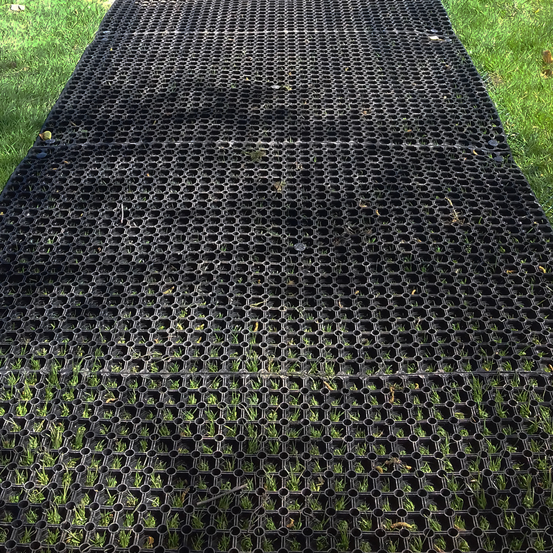 https://www.thegardenrange.co.uk/blog/wp-content/uploads/sites/2/2018/05/Lancaster-Golf-Clubs-Rubber-Grass-Mats-Path-Choosing-Grass-Mats.jpg