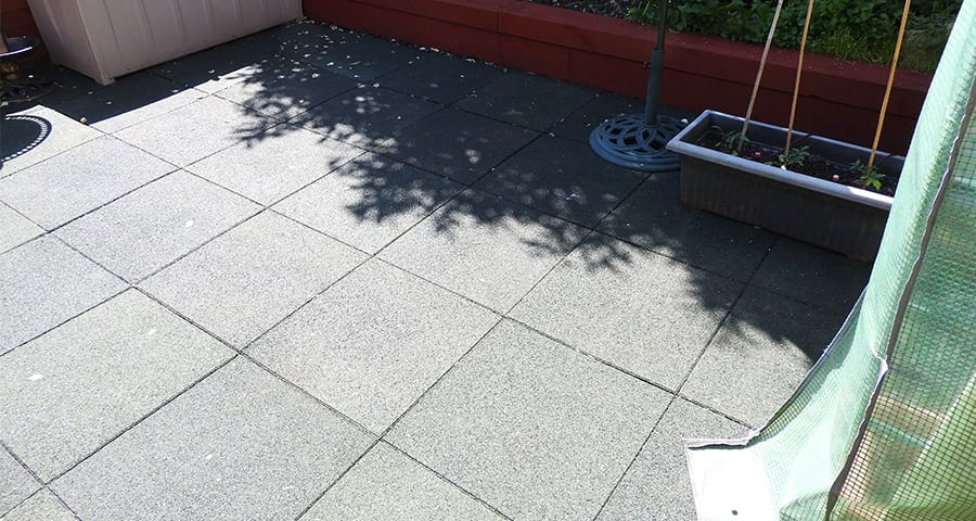 Rubber Tiles Used To Pave An Entire Backgarden Featured Image