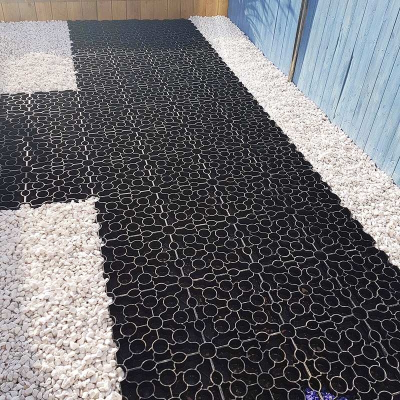 Black X-Grid Used To Create Multicoloured Gravel Path - Image 2