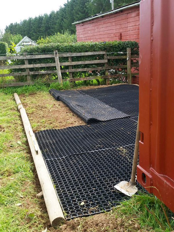 Grass Mats Behind Shipping Container In Horse Paddock - Image 2