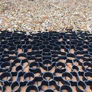 Laying-Gravel-Driveway-Using-Black-X-Grid