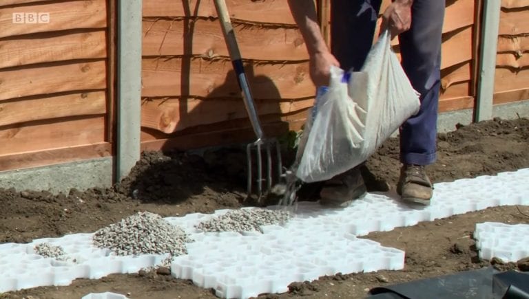 White X-Grid Filled With Gravel - Garden Rescue