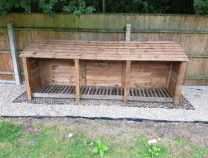 Log Store On Plastic Shed Base