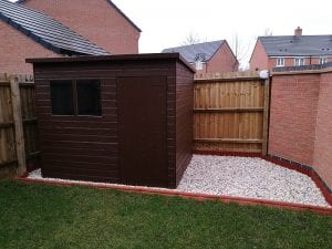 8ft x 6ft Plastic Base Under a New Tiger Shed's Wooden Shed