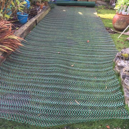 Grass-Reinforcement-Mesh-On-Garden---Mesh-Being-Installed