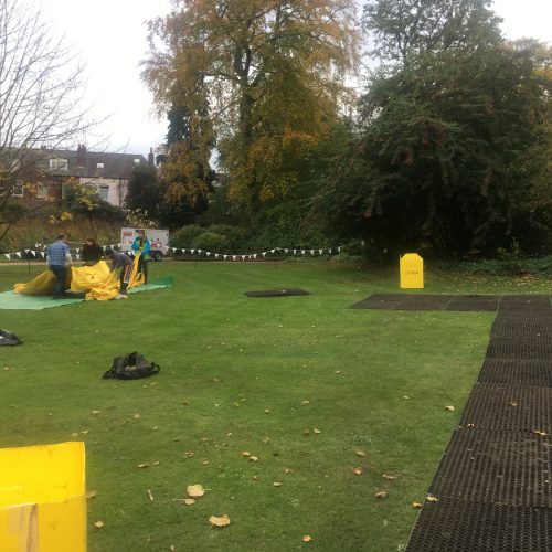 Rubber Grass Mats Being Installed - Illuminate The Gardens