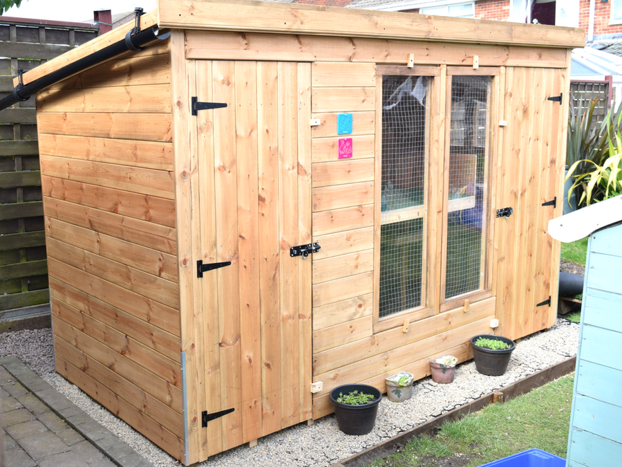 Plastic Shed Base Used Under a Rabbit Kennel And Run Featured Image