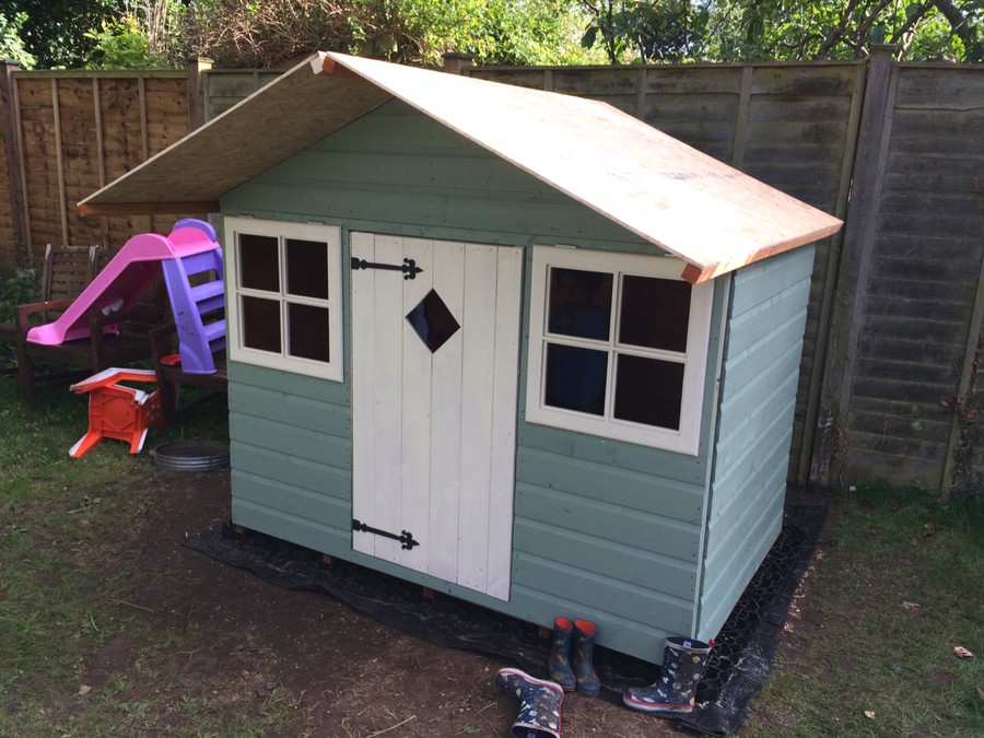 Wooden Playhouse On Plastic Playhouse Base Featured Image